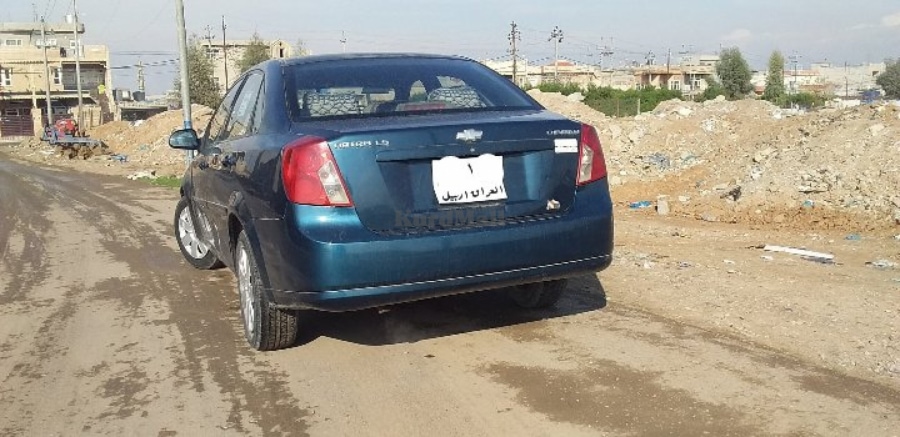 شۆفرلێت ئۆپترا ڕەنگی نیلی شێڤرۆلێت 0